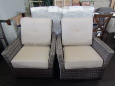 2x Agio Rattan swivel and rocking garden chairs, used but in good condition, one chair is missing