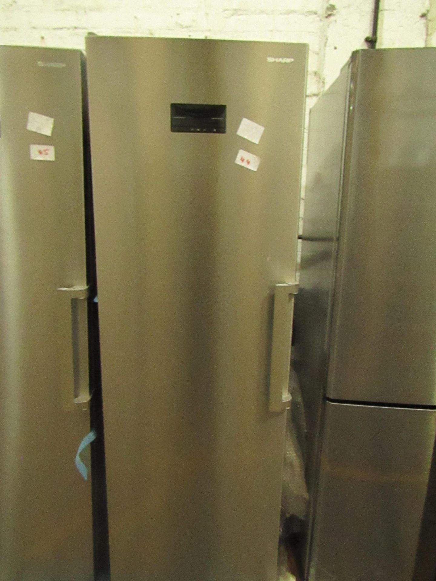 Sharp tall freestanding freezer, powers on but doesn't get cold