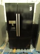 Hisense American fridge freezer with water dispenser, powers on but doesn't get cold
