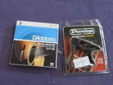 1x Dunlop - Trigger Capo Acoustic ( 83CB For 6 & 12 Strings ) - New & Packaged. 1x D'Addario - Set