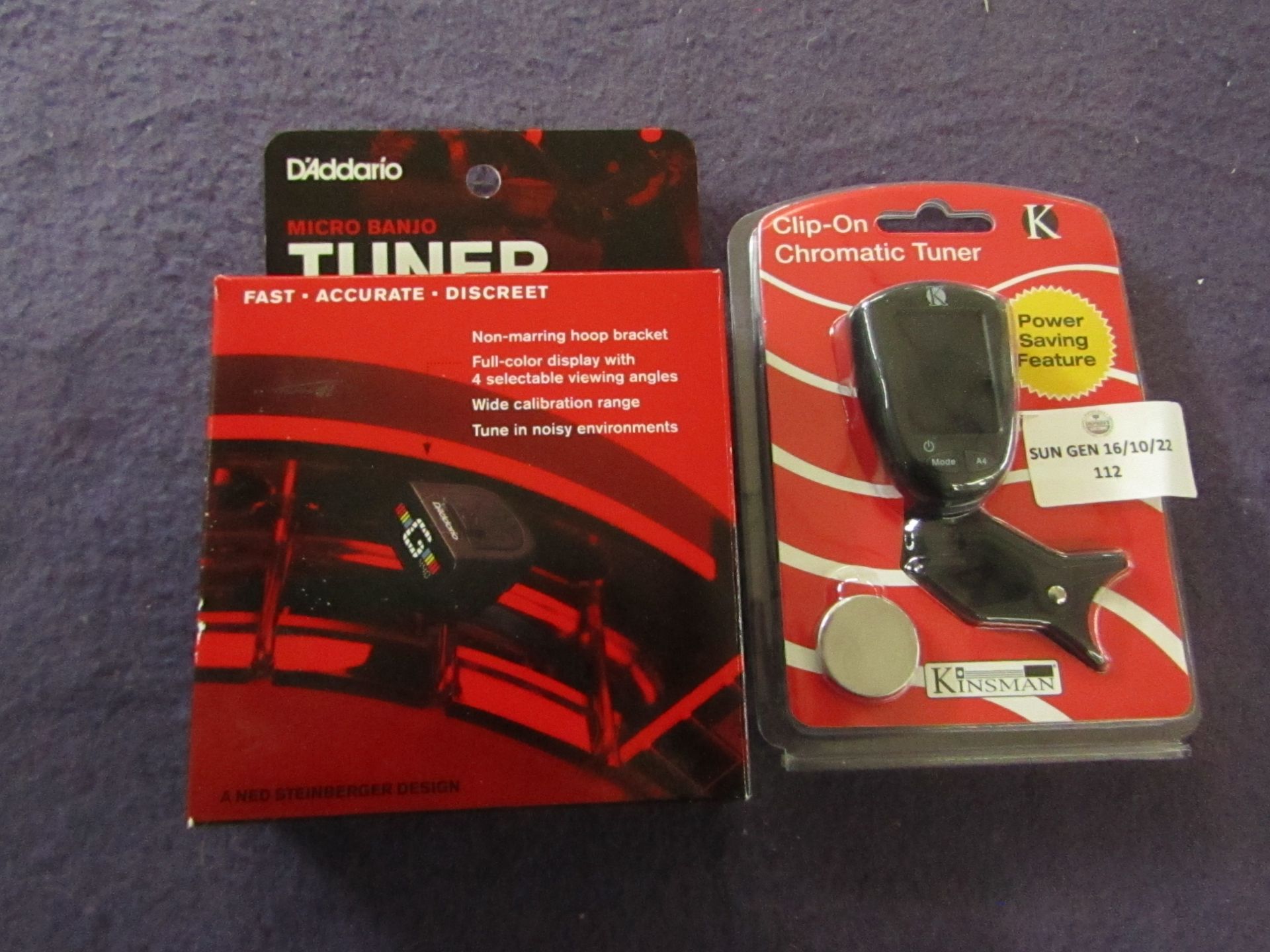 1x Kinsman - Clip-On Chromatic Tuner - Unused & Packaged. 1x D'Addario - Micro Banjo Tuner -