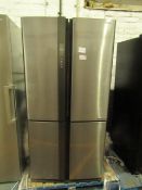 Sharp American style fridge freezer, powers on but doesn't get cold