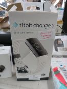Fitbit Charge 3 Special Edition boxed powers on and charged