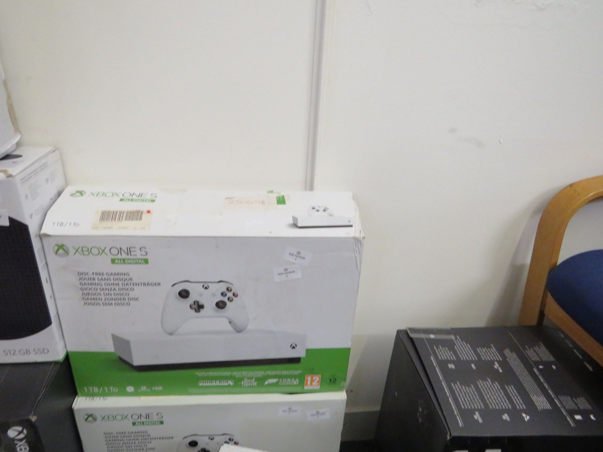 Xbox ONE S 1TB All digital console, powers on and goes through to a screen which says time to