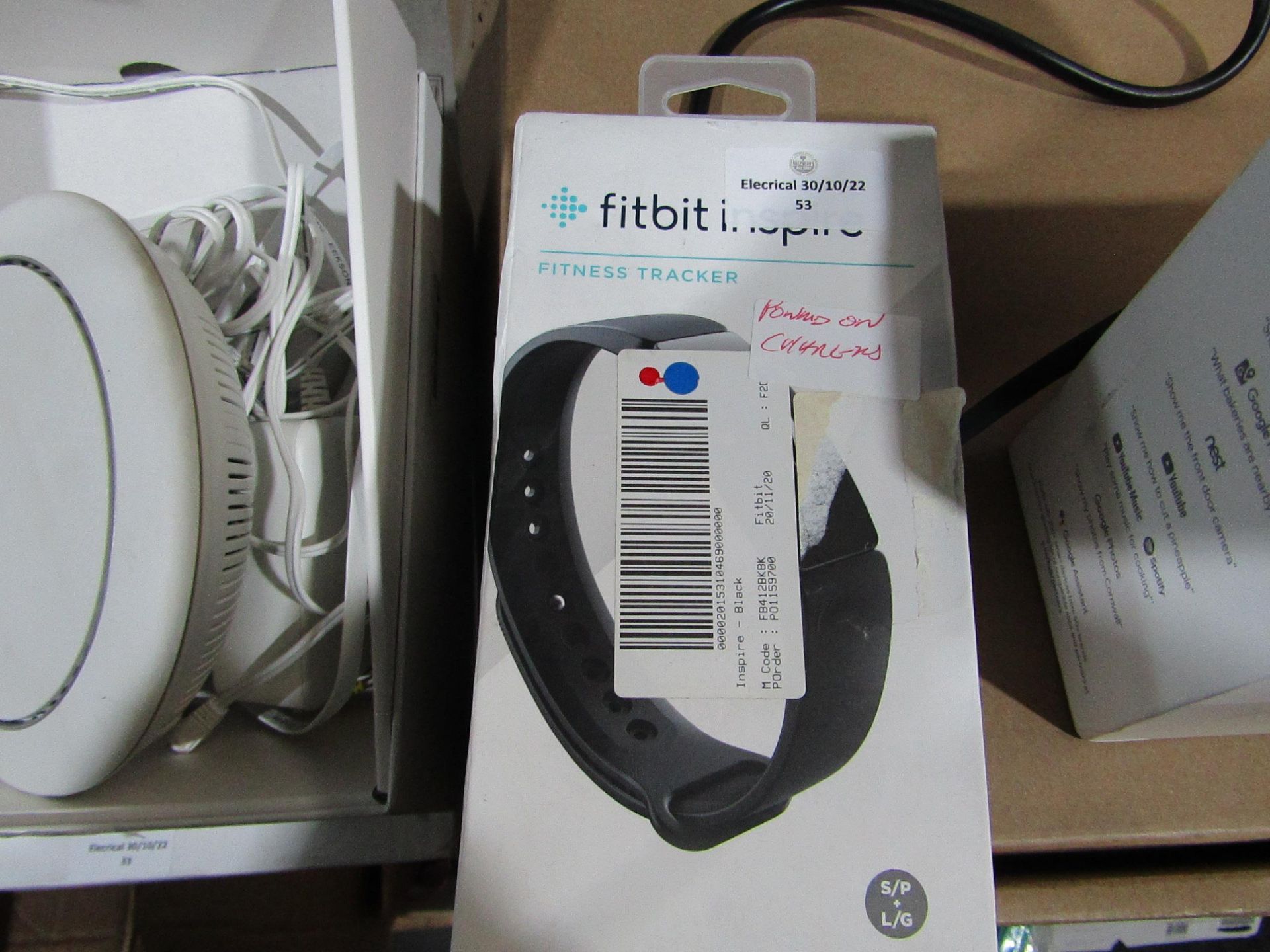 Fitbit Charge Inspire Fittness Tracker boxed powers on and charged