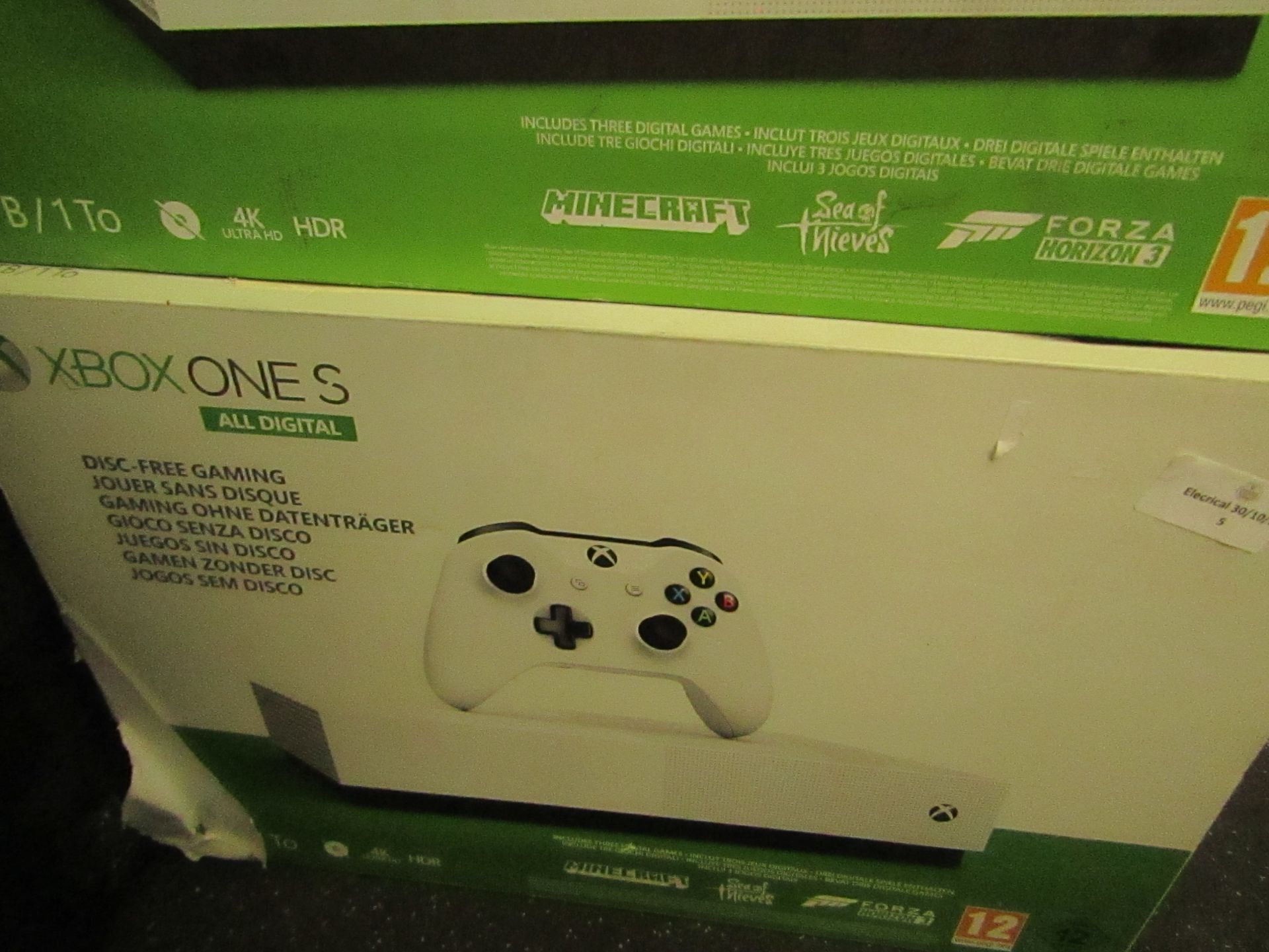 Xbox ONE S 1TB All digital console, powers on and goes through to a screen which says time to