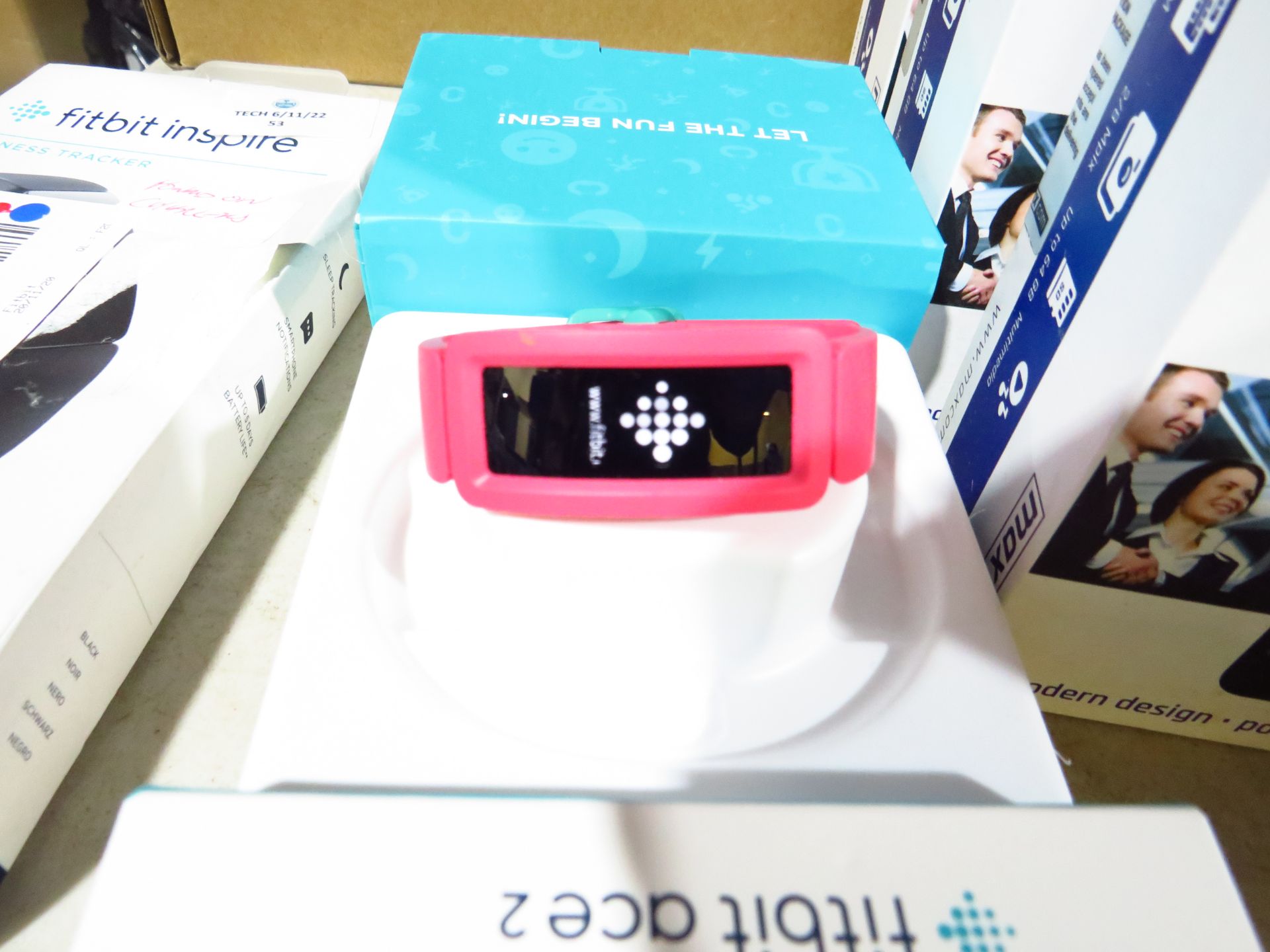 Fitbit Ace2 Activity tracker for Kids boxed powers on and charged