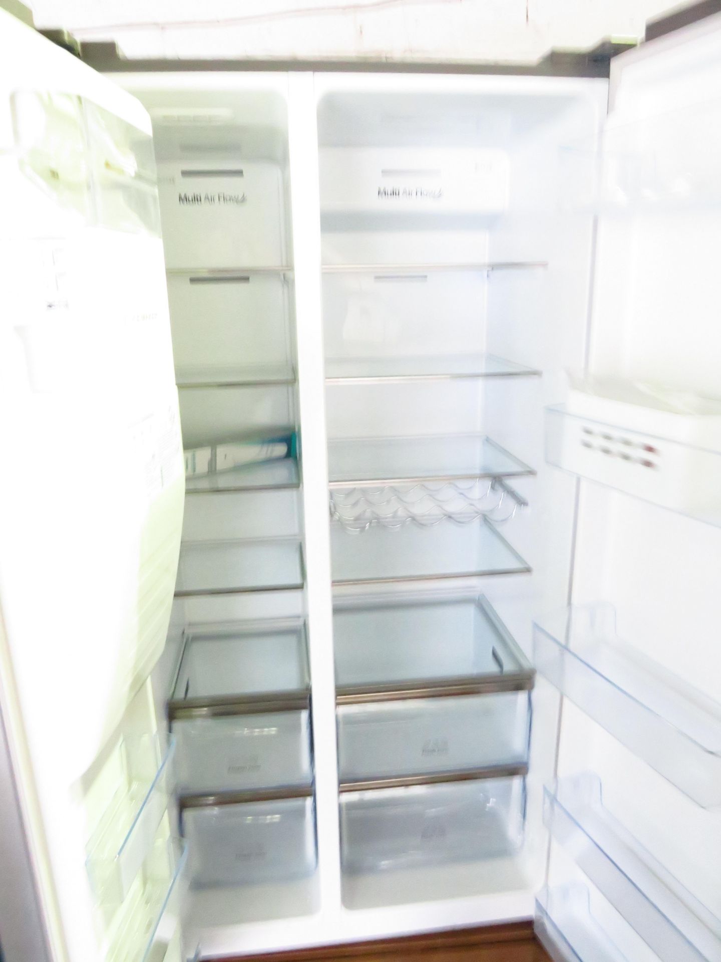 Hisense American fridge freezer with water dispenser, hasÿ 4 dents on fridge door, powers on but - Image 2 of 2