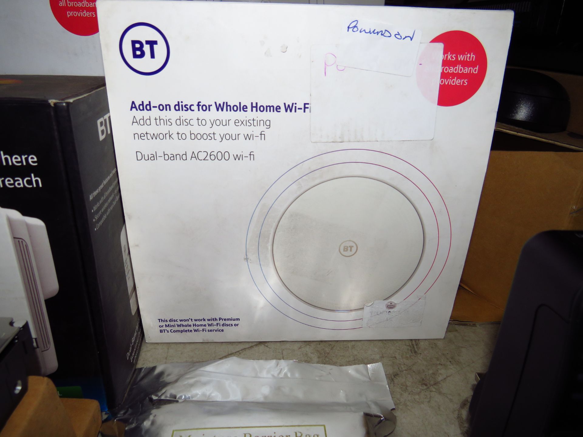 BT Whole Home AC2600 add on disc, powers on and boxed, we havent checked any further