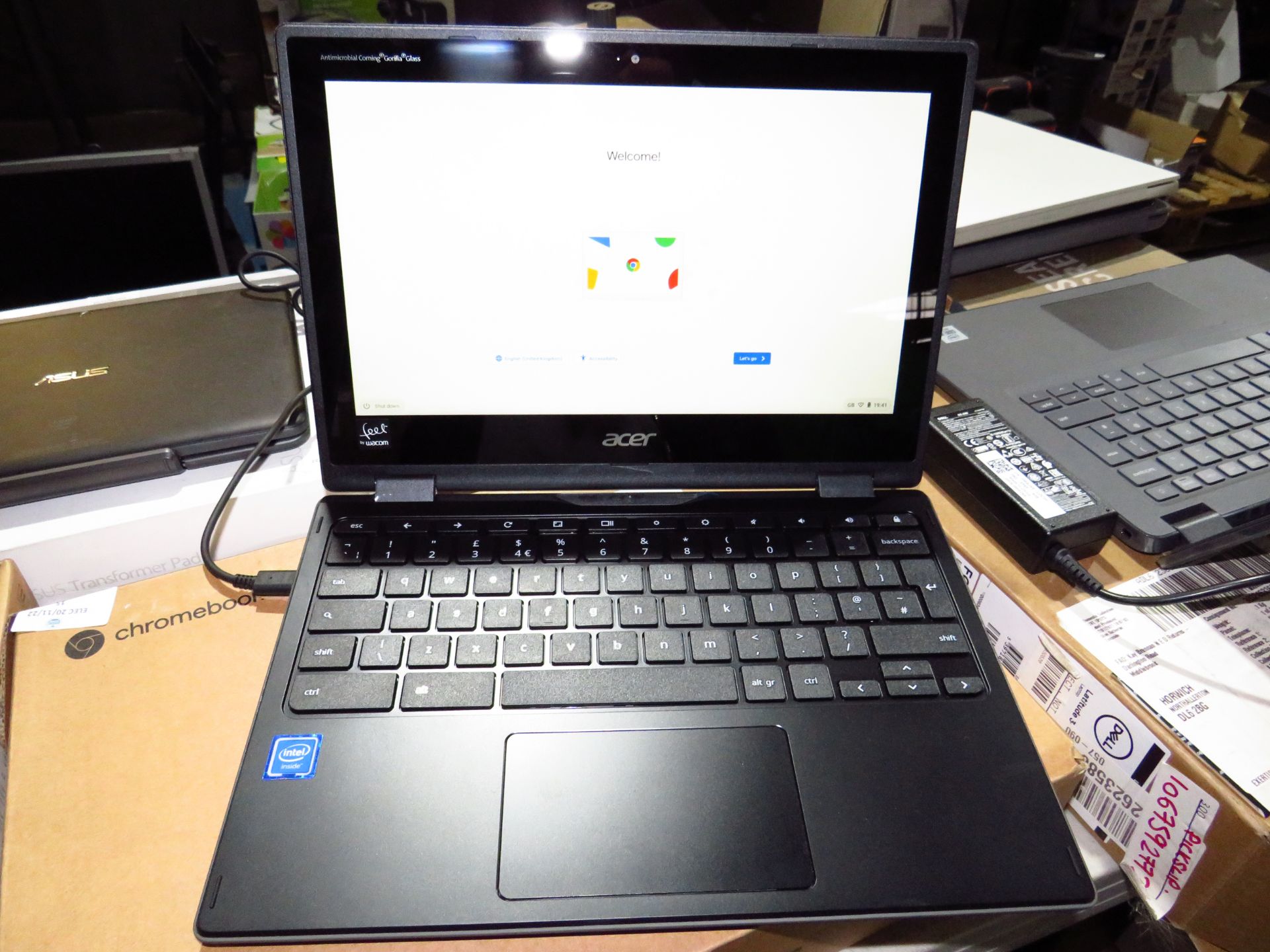 Asus Chrome Book Spin 511 laptop, powers on and appears to be in 1st person set up, comes with
