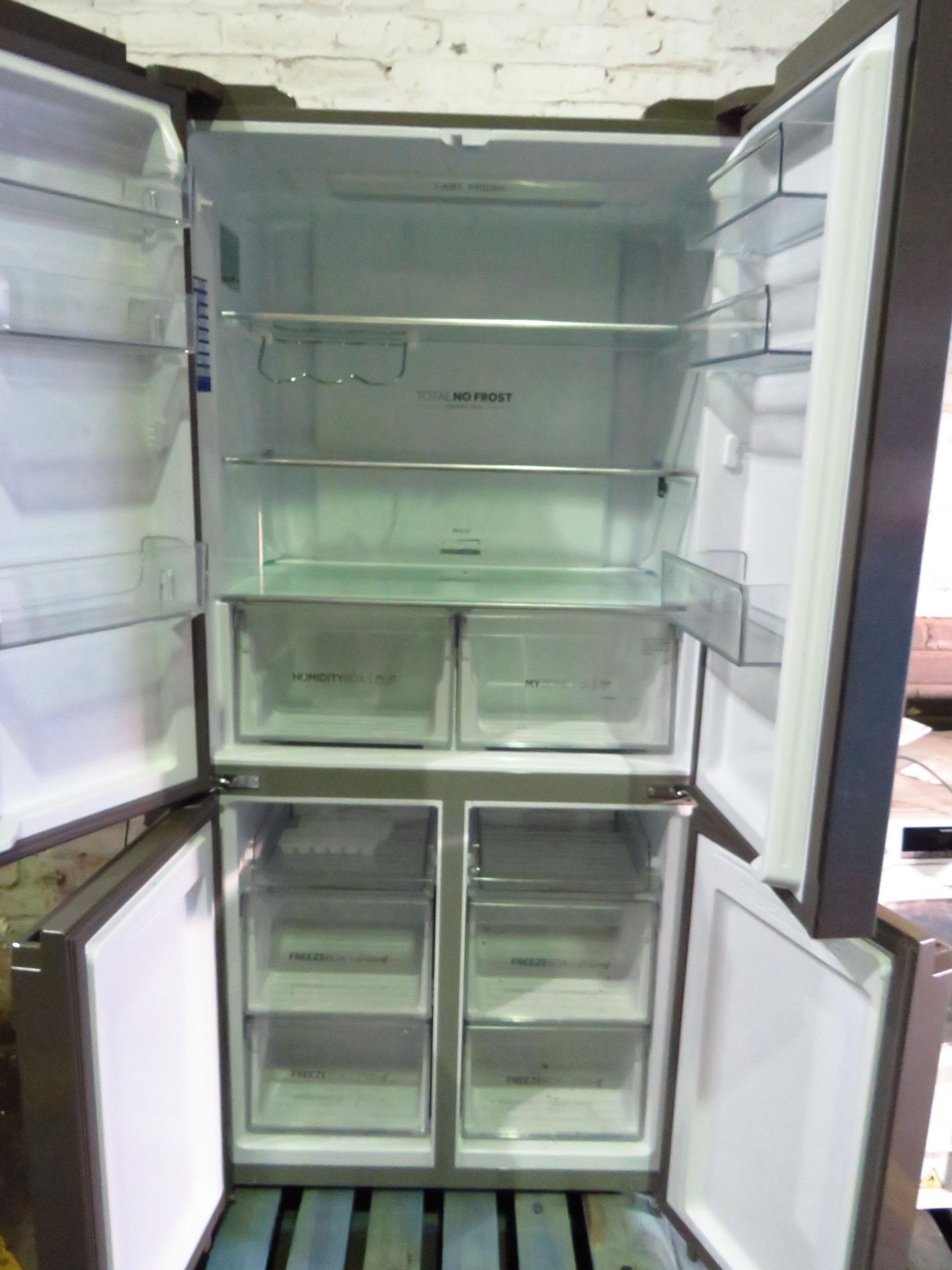 Haier 4 door american style fridge freezer, tested and working for coldness, has a small dent on the - Image 2 of 2