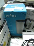 Amazon Echo Speaker in original packaging powers on & illuminates