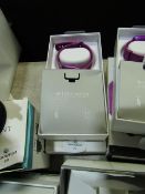 Fitbit Versa LTE edition futness tracker, powers on, in orignal box with charger