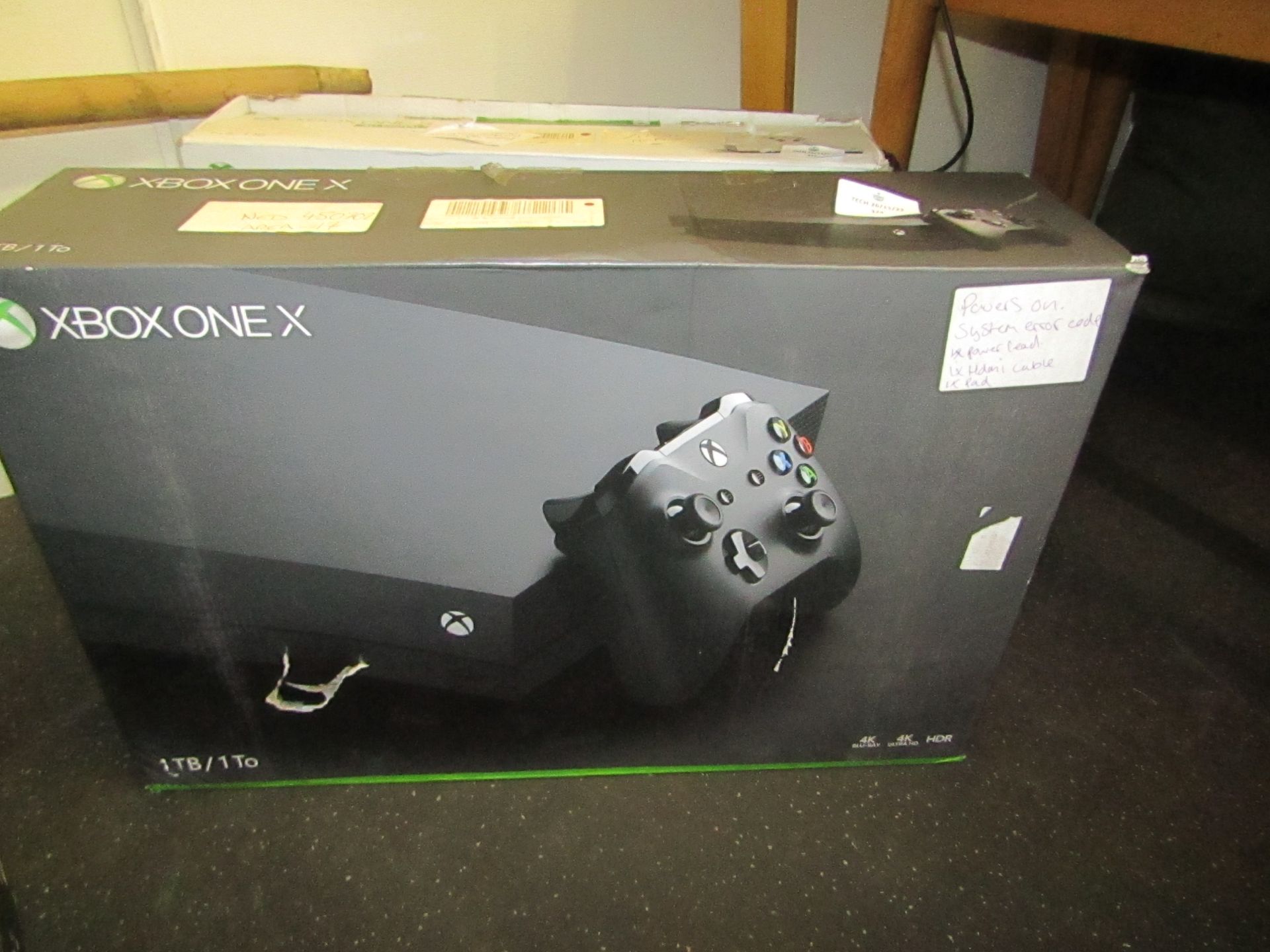 XboxOne X 1Tb games console, powers on but has a system fault, comes with power cable, HDMI lead and
