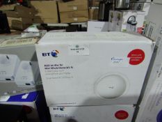 BT AC1200 Mini Whole home wifi add on disc, boxed and powers on but we havent checked it any
