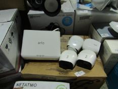 Arlo Pro wirelfree 4 camera system, unchecked and in non orignal box, set looks to contain a hub and