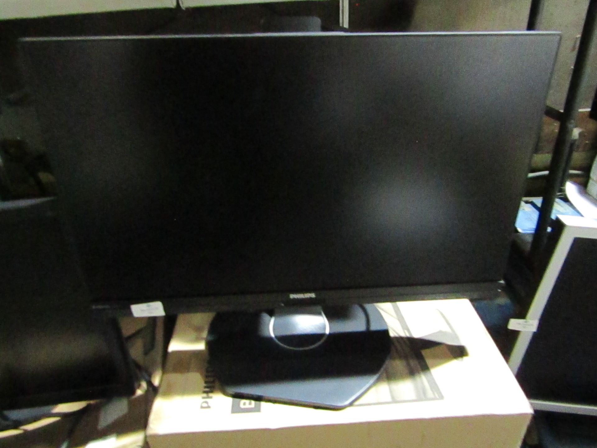 Phillips B Line 24" LCD Monitor with Full HD powers on and seems to work as designed , all cables