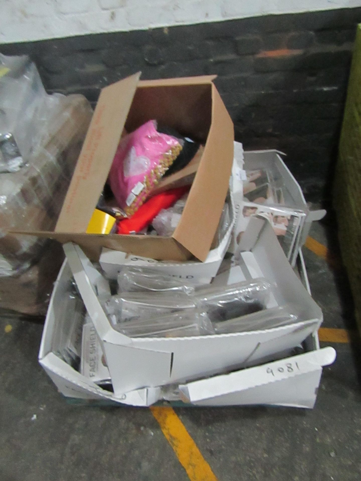 Pallet containing approx 80 plastic face shields and a box of mixed items