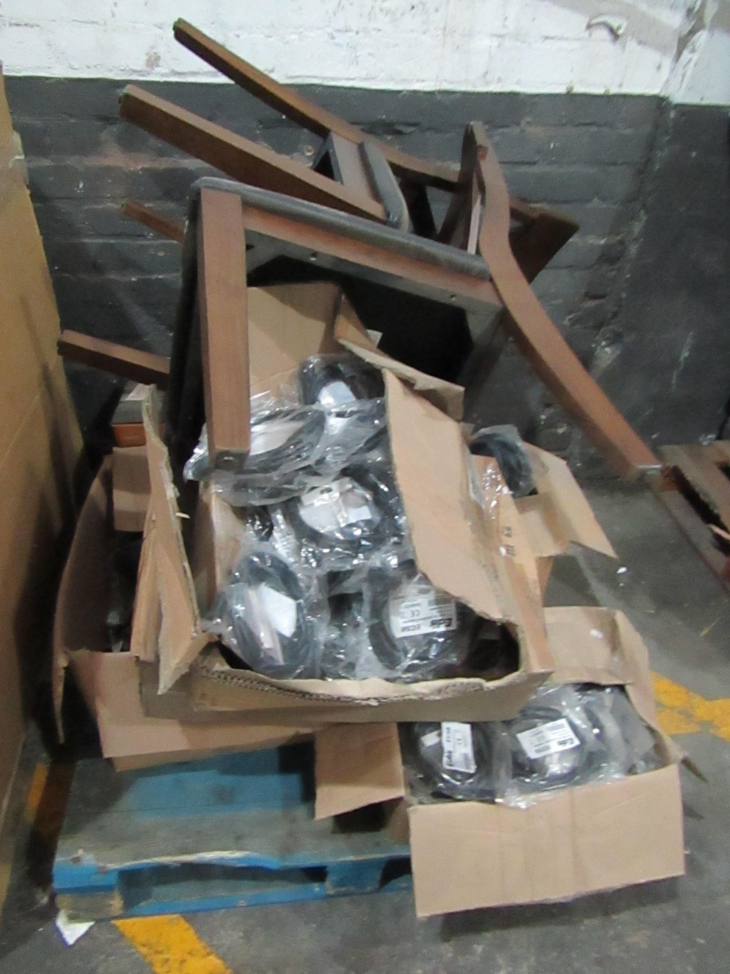 Pallet of uncollected customer order, inclines dining chairs, paper shredders, spare wheel and more