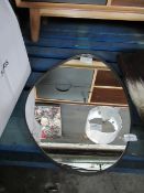 Metal framed off shaped mirror, good condition