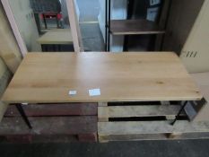wooden bench with black legs