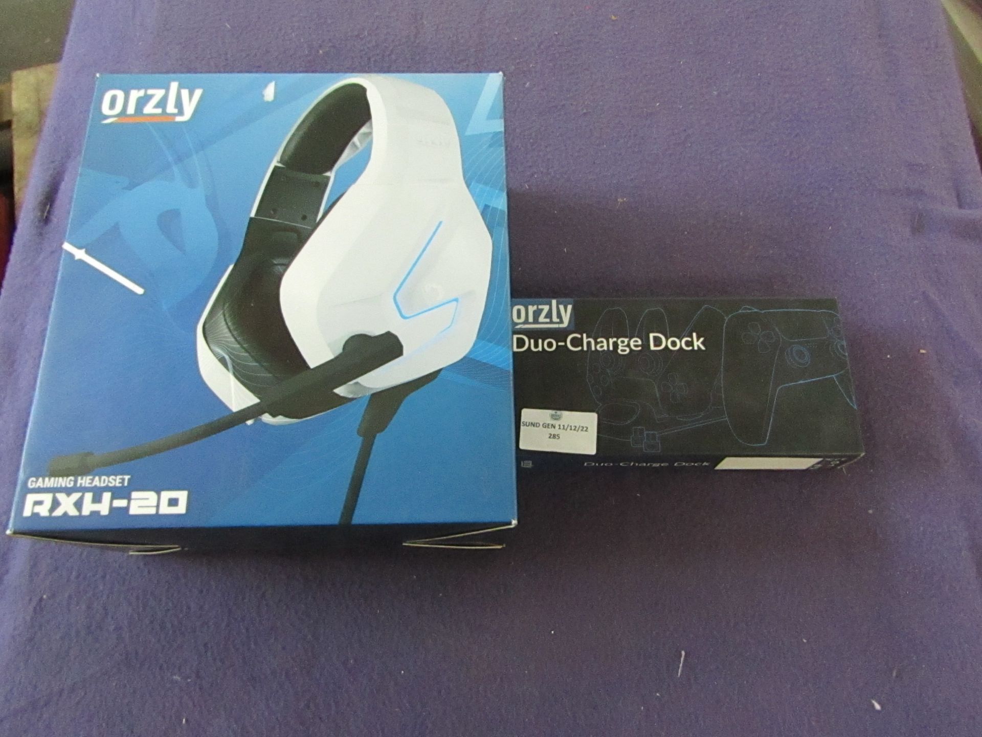 1x Orzly - RXH-20 White Gaming Headset - Unchecked & Boxed. 1x Orzly - Duo Charge Dock - Unchecked &