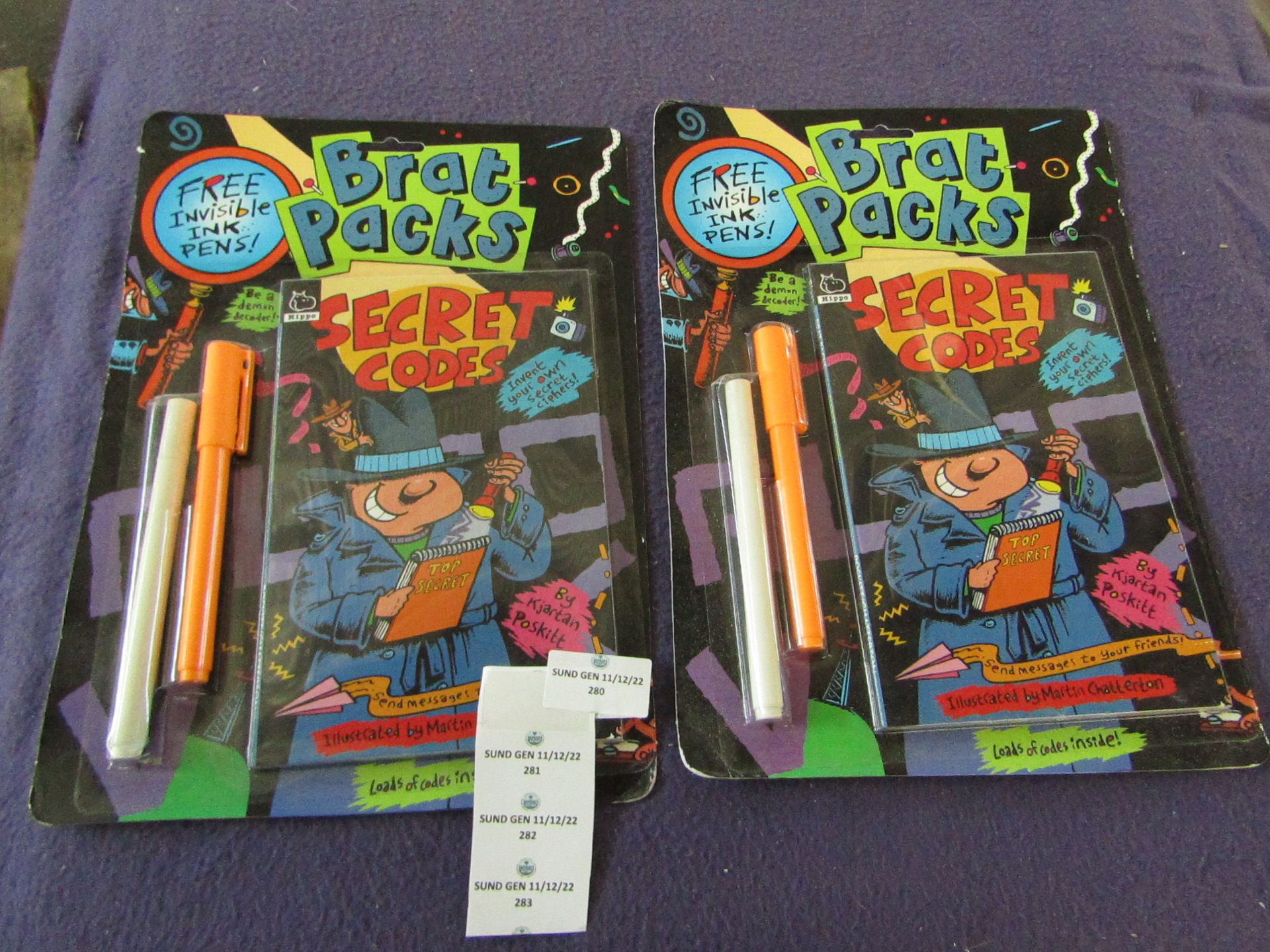 2x Brad Packs - Secret Codes - Unused & Packaged.