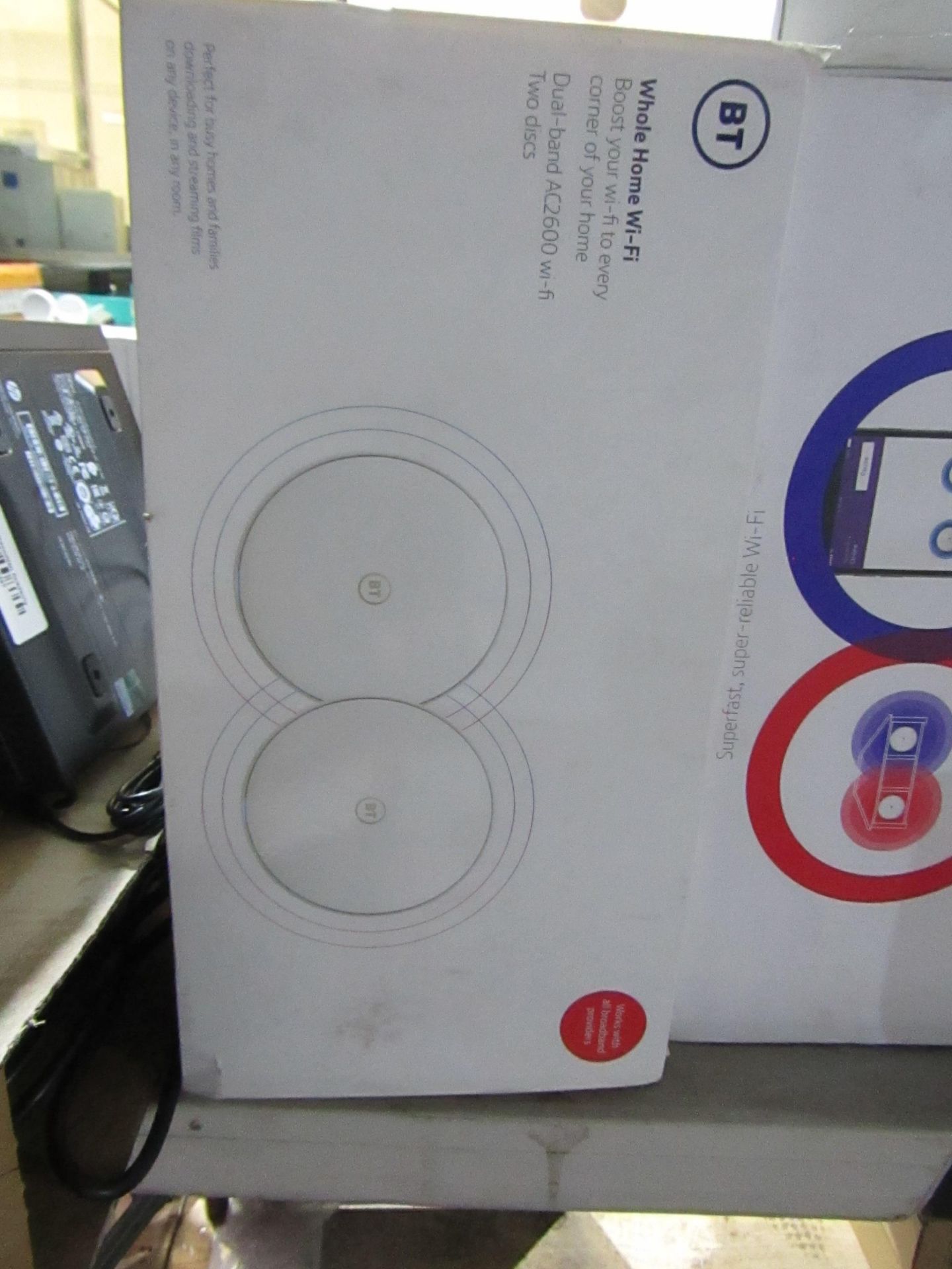 Set of 2 BT Whole Home AC2600 wifi booster discs, powers on and boxed, we havent checked any