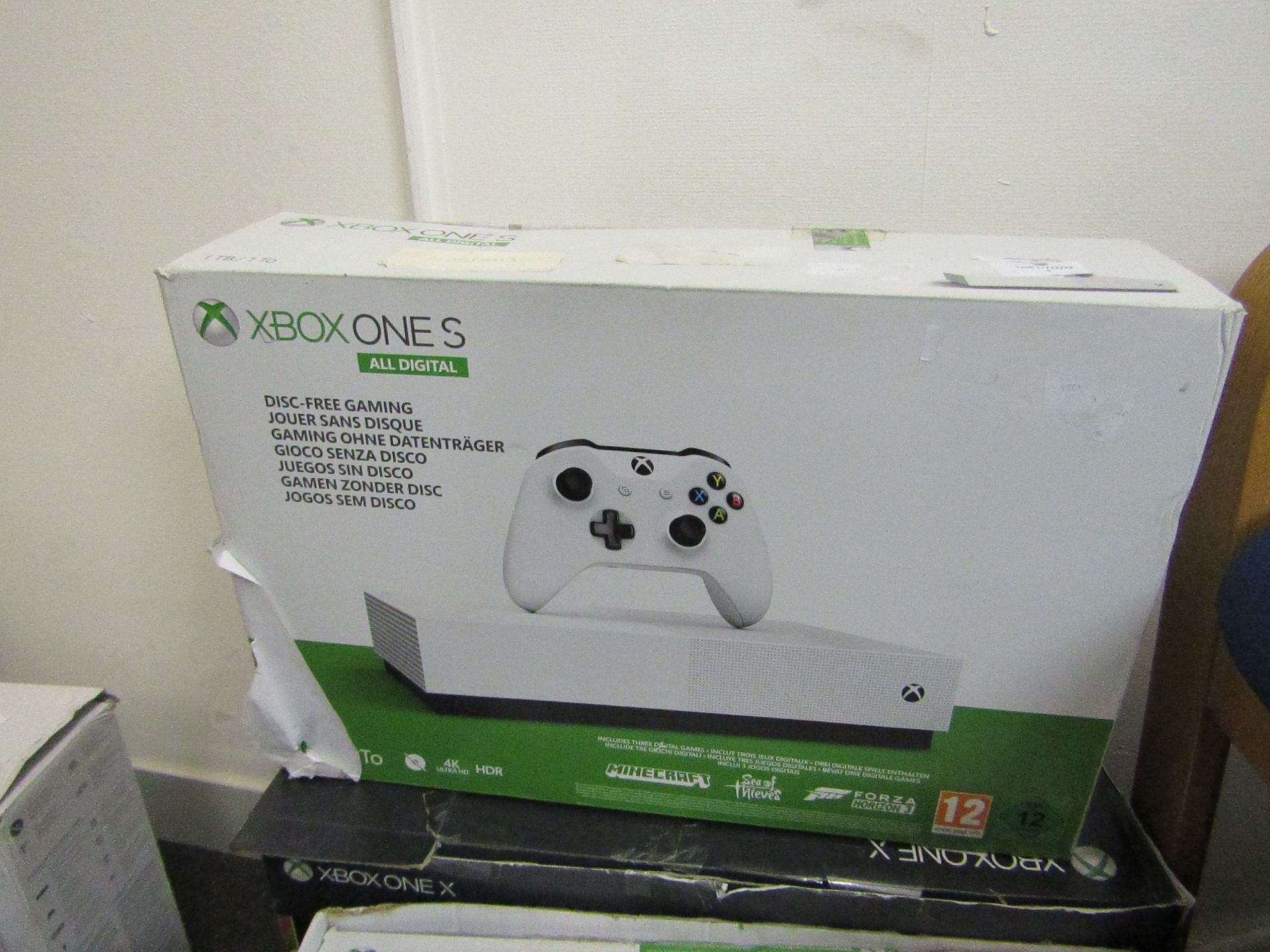 Xbox ONE S 1TB All digital console, powers on and goes through to a screen which says time to