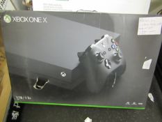 XboxOne X 1Tb games console, powers on but has a system fault, comes with power cable, HDMI lead and