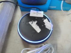 Amazon echo small smart speaker, powers on and illuminated but we havent gone any furtrher with