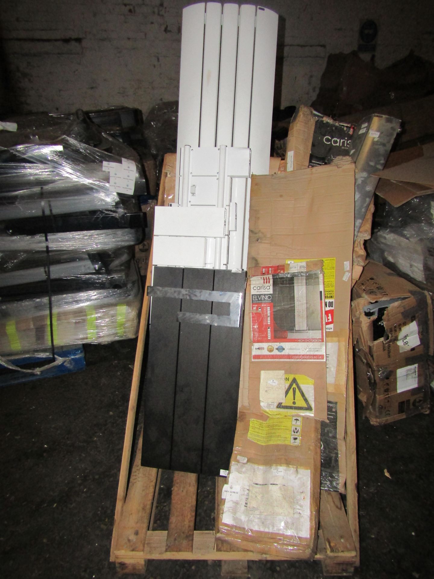 Pallet of approx 5 various designer radiators all with either missing caps or dents.