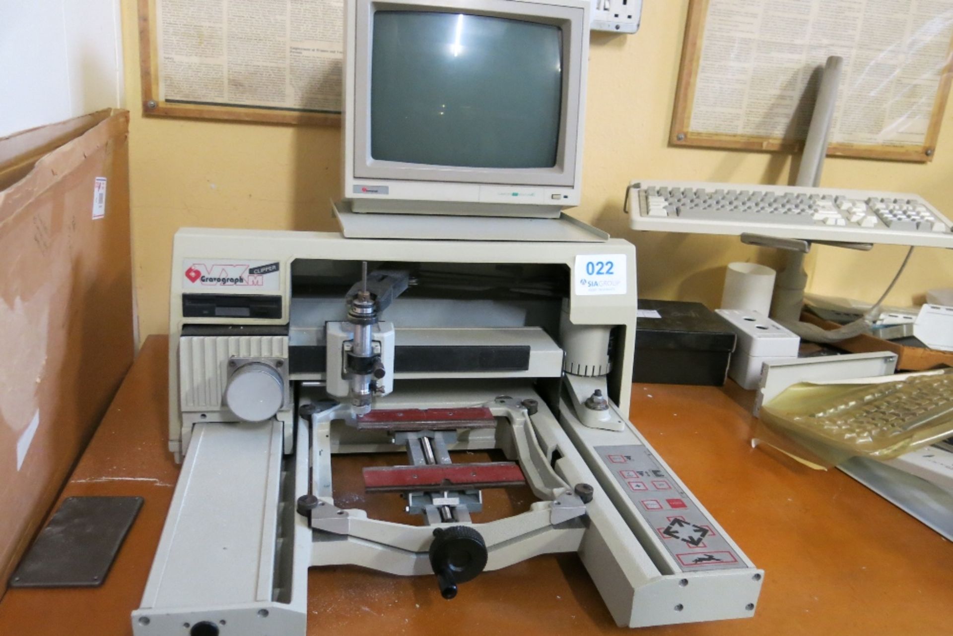 Gravograph M Clipper computer controlled engraving machine with bench