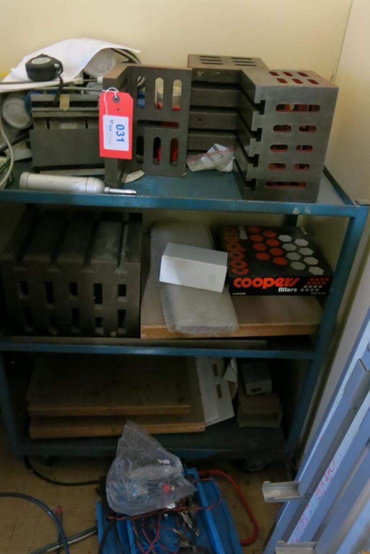 Contents of trolley to include (3) slotted machining blocks and (1) angle plate