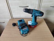 Makita cordless drill with battery and charger