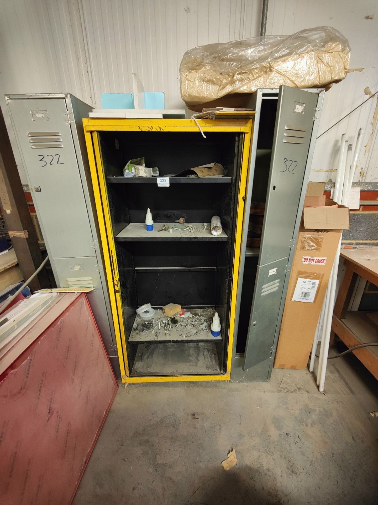 Metal cabinet with contents and (2) double lockers