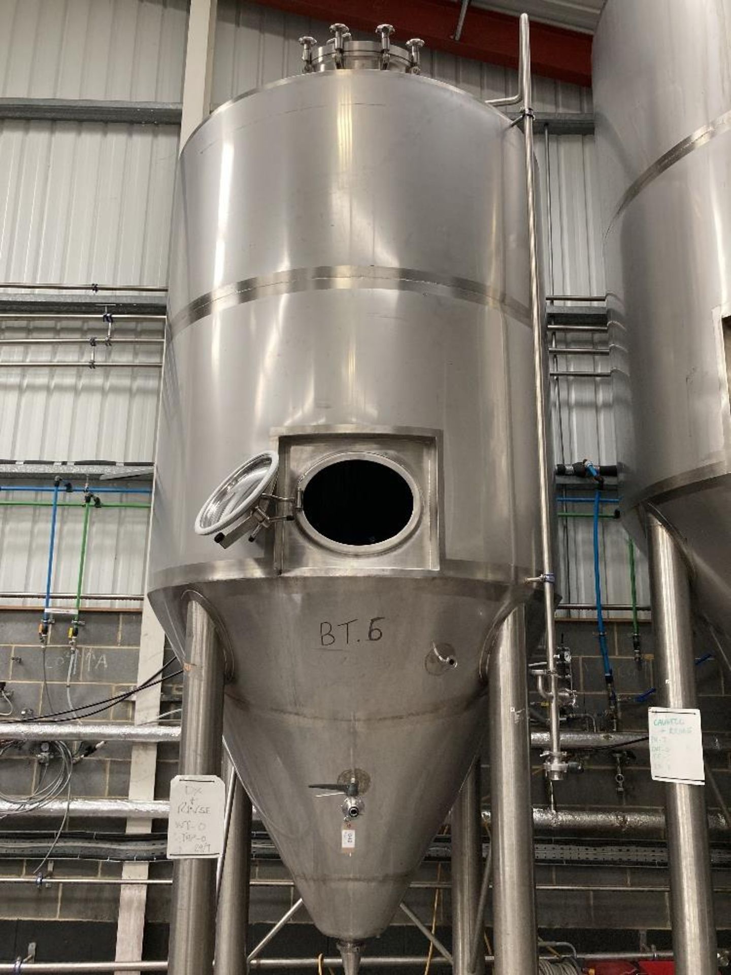 Unbranded stainless steel pressurised conical vessel