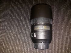 Nikon AF-S NIKKOR 55-300mm 1.4.5-5.6G ED VR lens attachment