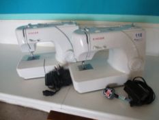 (2) Singer Sewing Machines