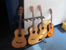 (4) Accoustic Guitars and Stands