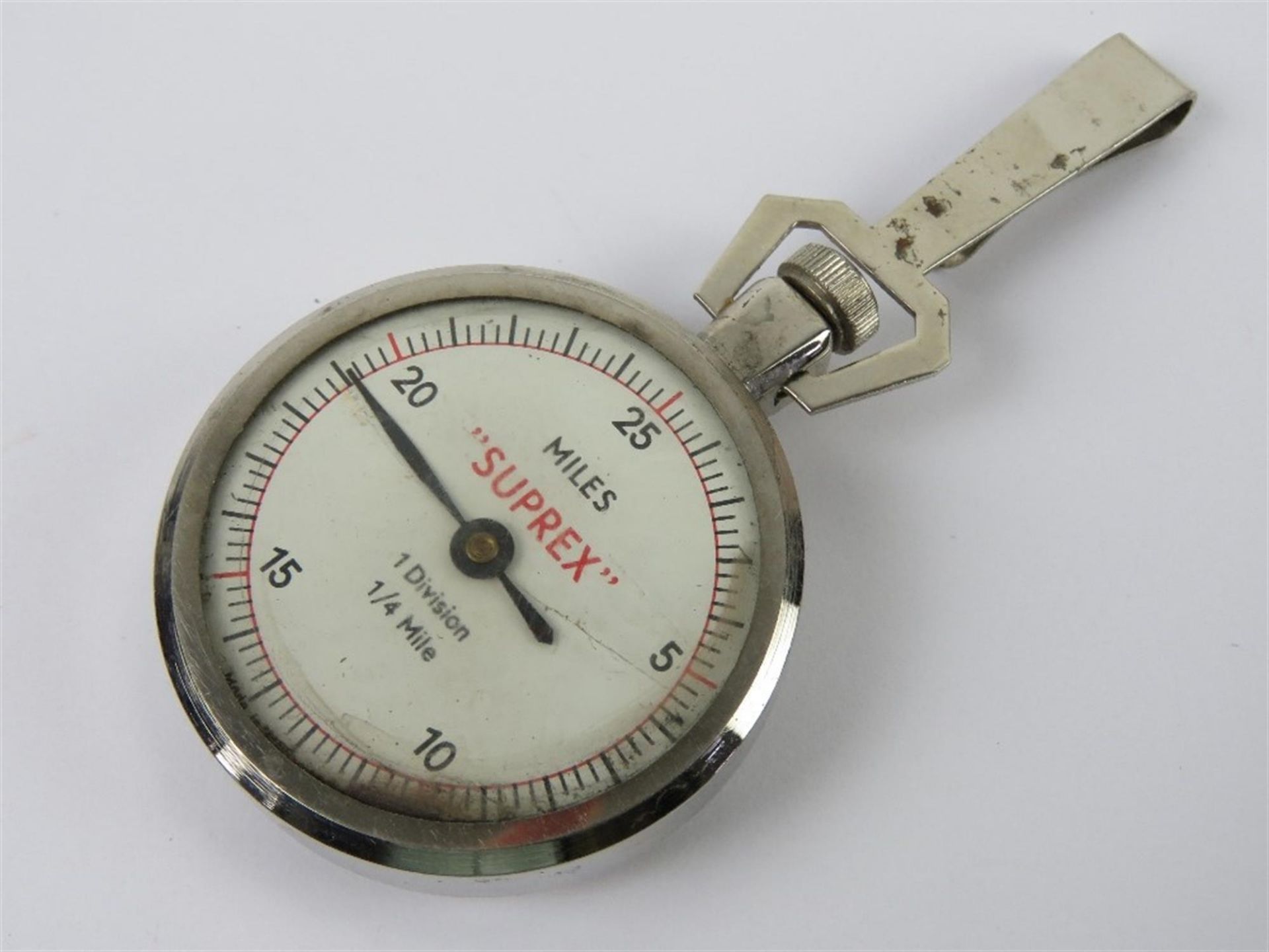 A vintage Suprex Pedometer 25 Mile Dial