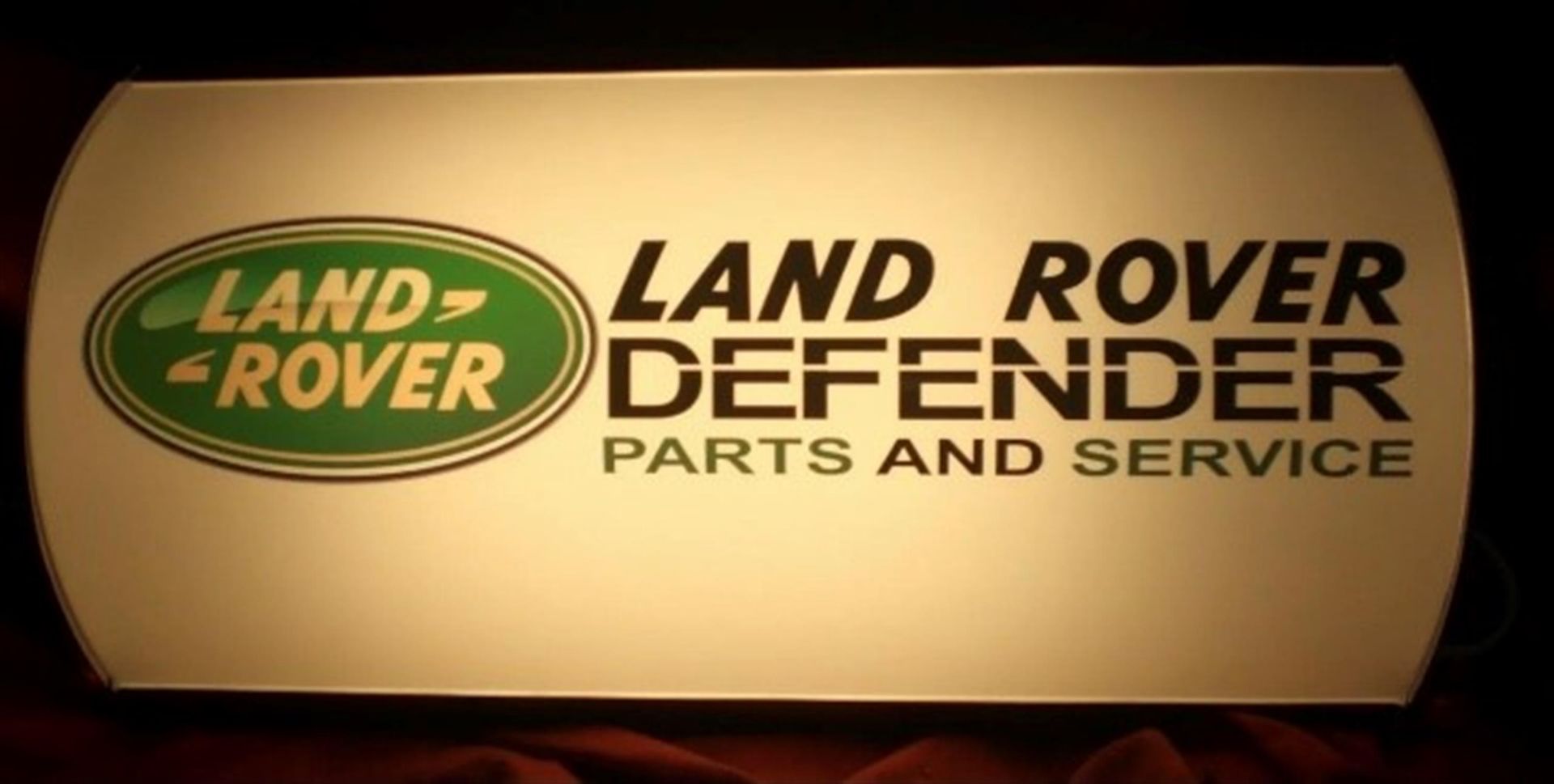 A Contemporary Land Rover-Themed Convex Illuminated Wall Sign