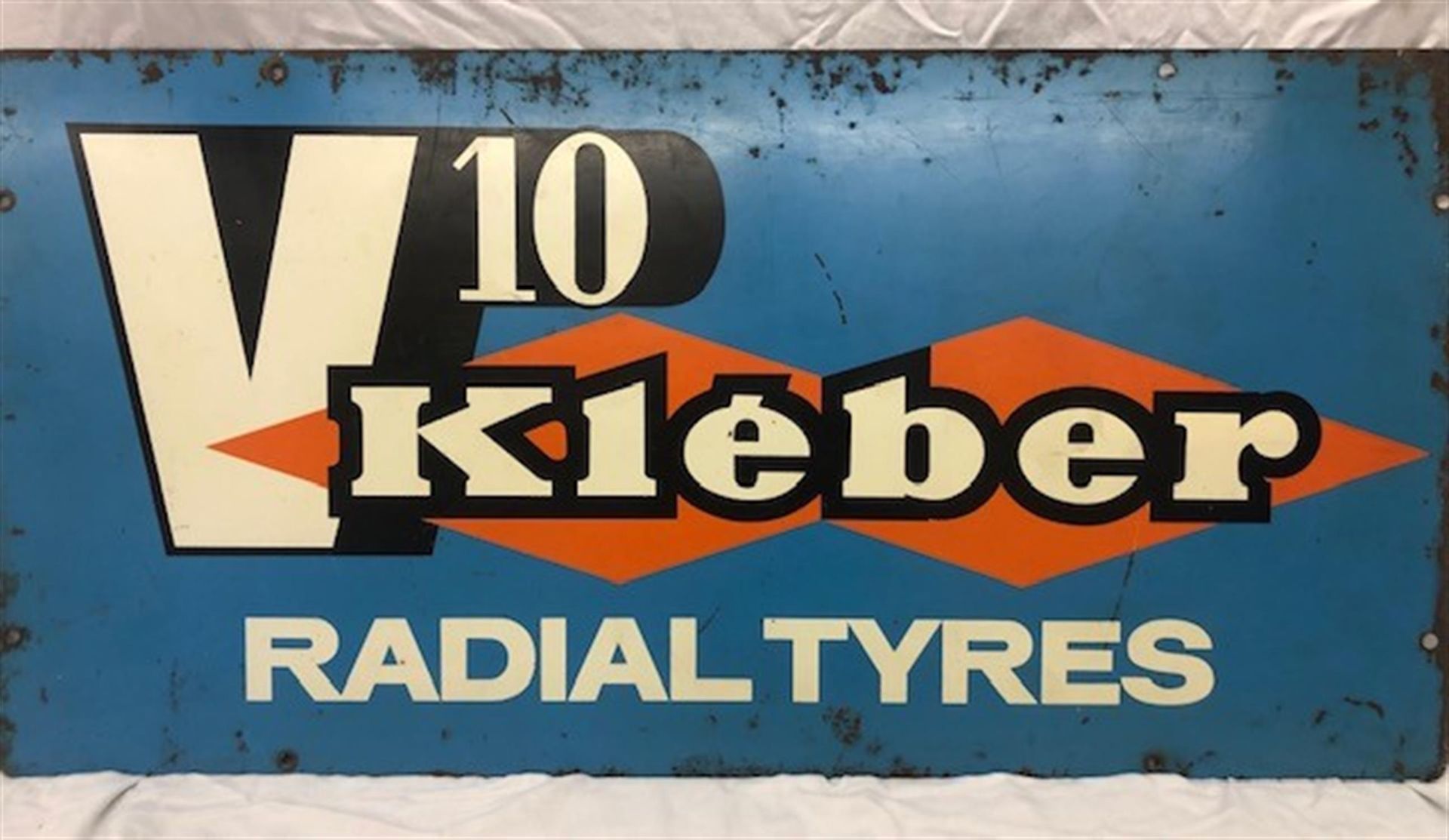 An Original Enamelled Metal Advertising Sign for V10 Kléber Radial Tyres