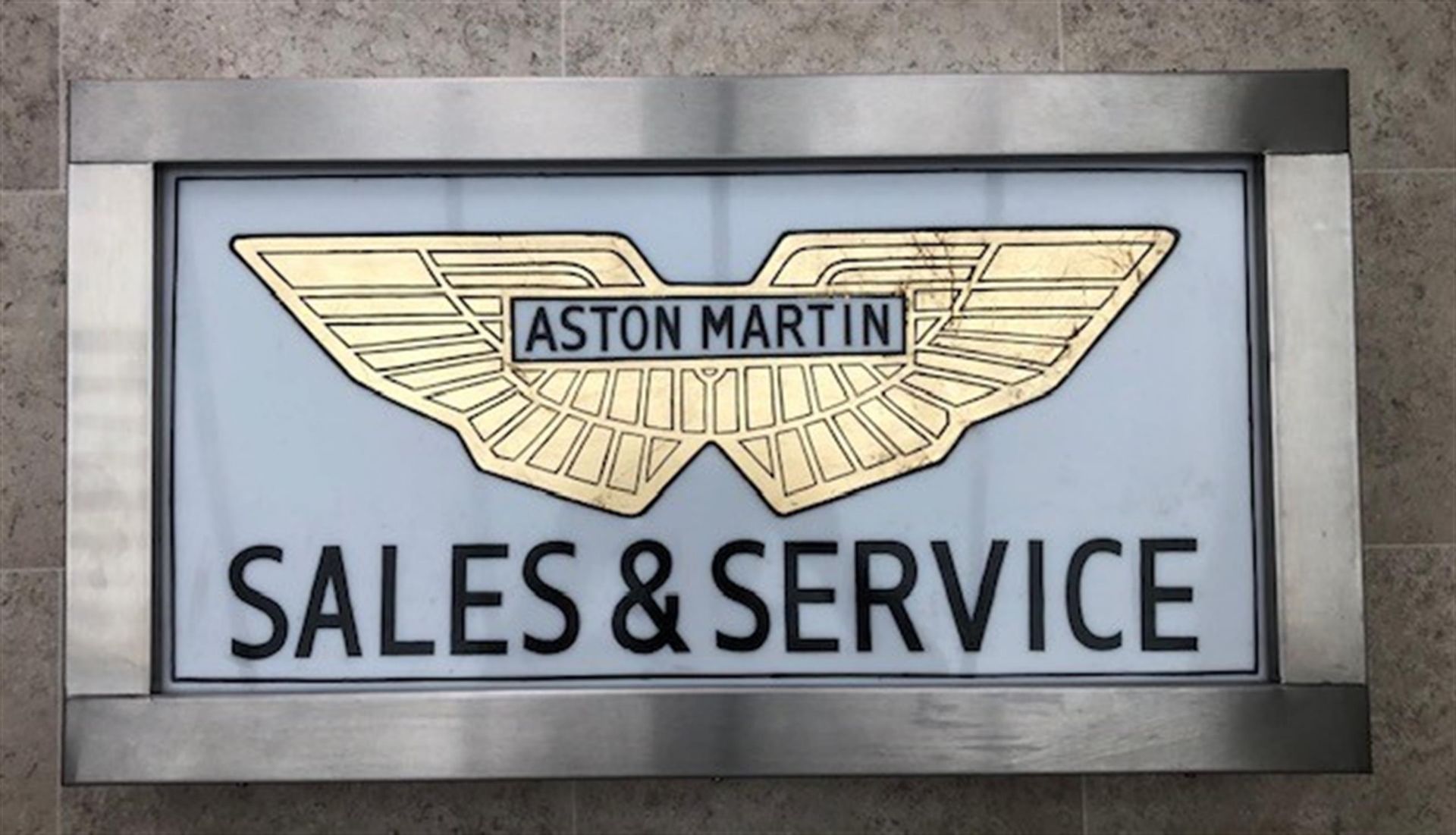 A rare sign-written Aston Martin 'Sales & Service' Dealership-Type Advertising Back-Lit Box Sign.