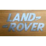 A font-correct 'Land Rover' sign in lazered-steel cut-outs