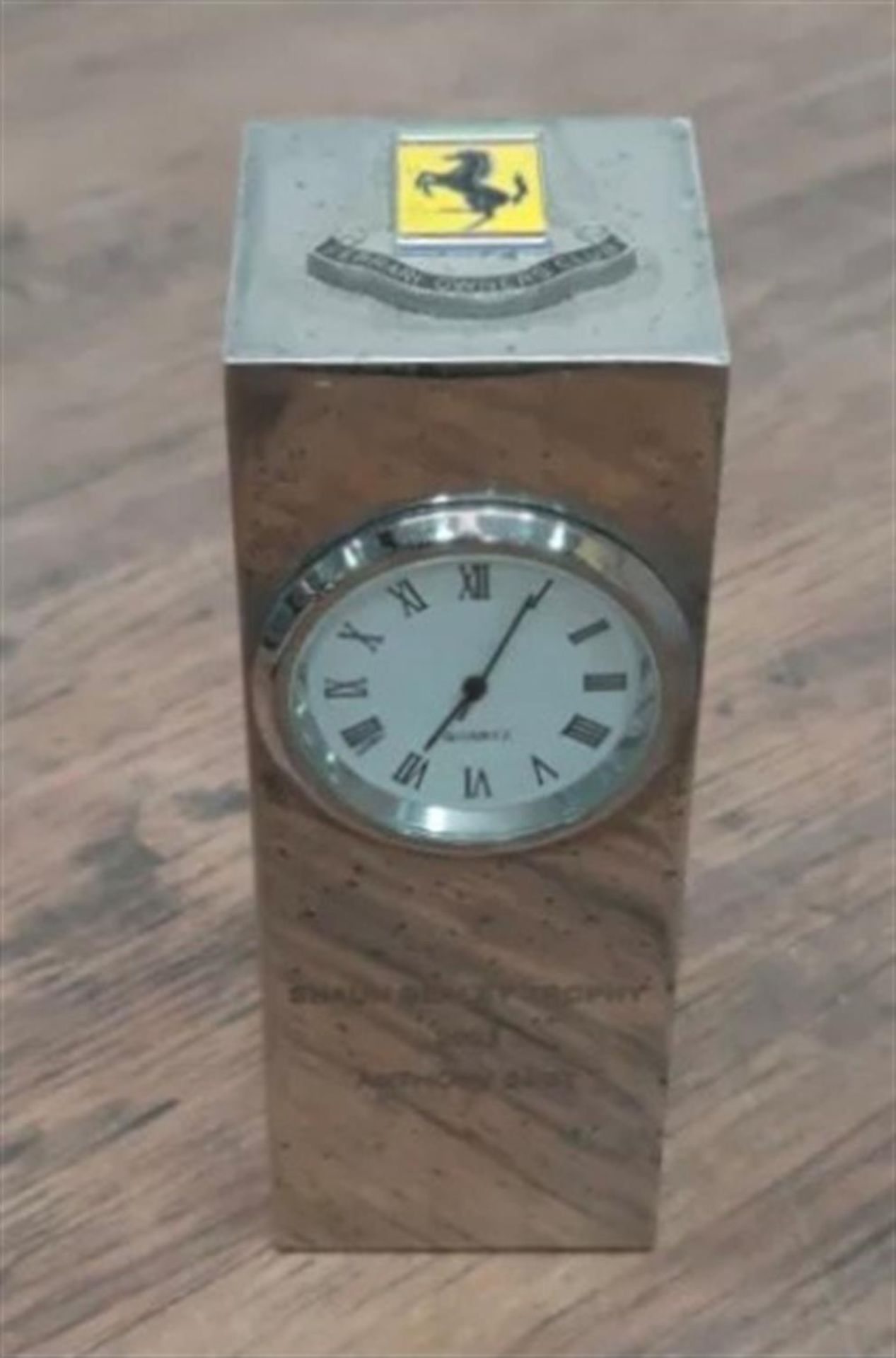 A rare, silver-plated Ferrari Owners' Club 'Shaun Bealey Trophy' clock