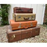 Selection of Four Well-Travelled Suitcases