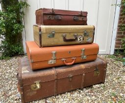 Selection of Four Well-Travelled Suitcases