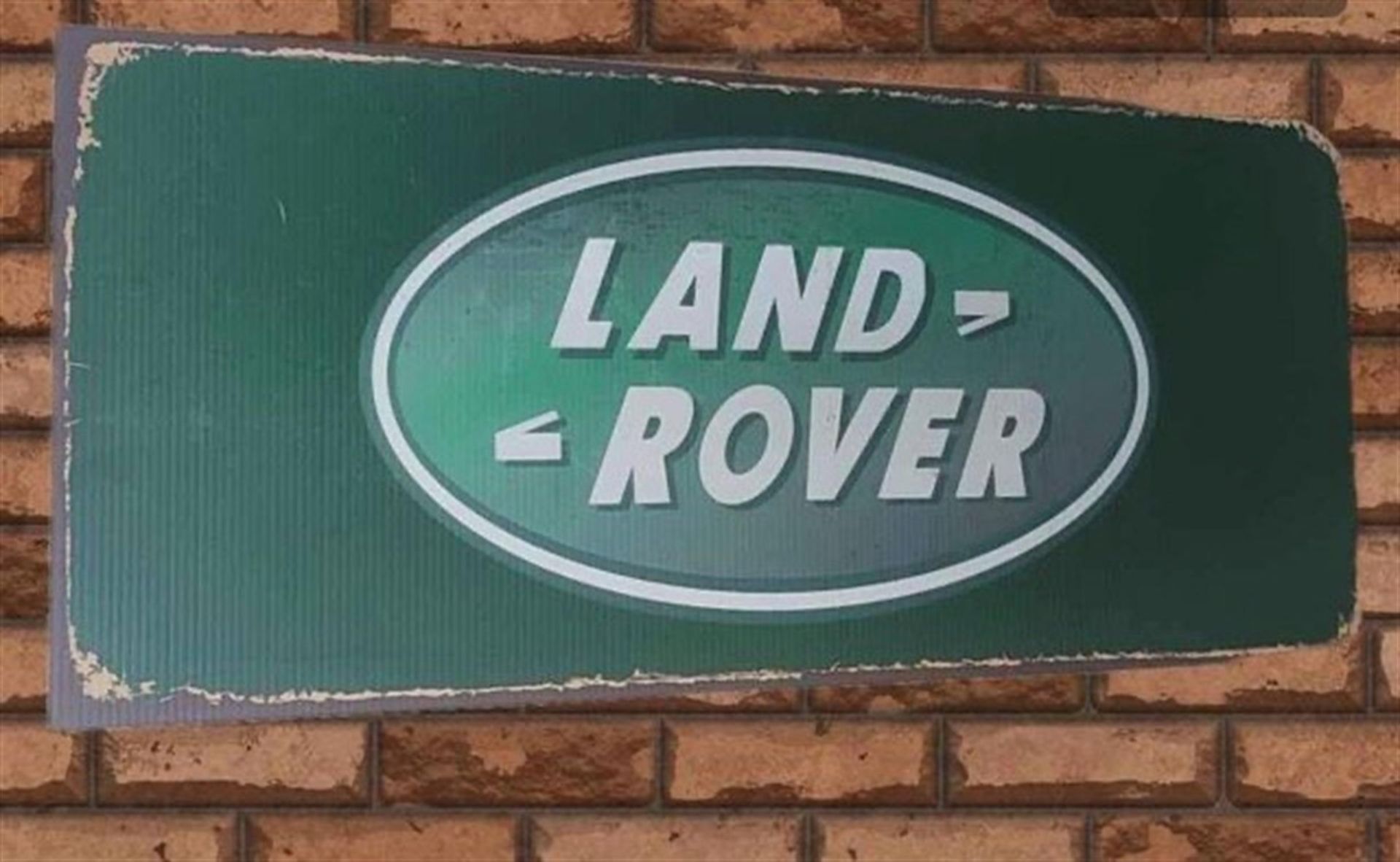 A Large Contemporary Metal Land Rover Wall Sign