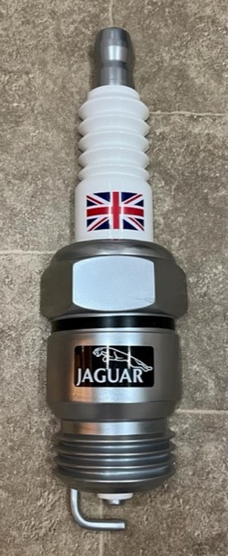 An Oversized Jaguar-Themed 'Spark Plug' - 3D Fibreglass Wall Art